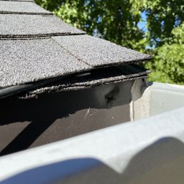 More poor quality. This corner wasn't tacked down, as you can see in the other photo.