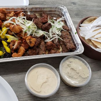 Ani's Chicken - Catering tray of meat with side of hummus, egg plant dip, and pita bread. So good! - Mediterranean Near Me - Montebello, California