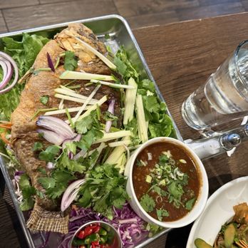 Manee Thai Cuisine - Fried tilapia with garlic sauce! - Thai Near Me - The Colony, Texas Manee Thai Cuisine - Fried tilapia with garlic sauce! - Thai Near Me - The Colony, Texas