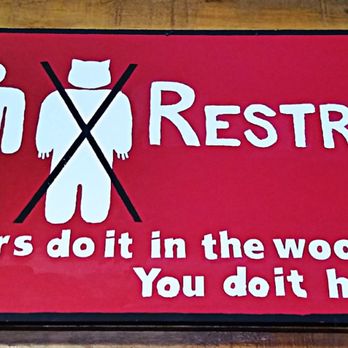Smokey Bones - a sign for restrooms - Barbeque Near Me - Maumee, Ohio