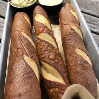 Arbor Brewing - Pretzel spear with cheese and mustard - Breweries Near Me - Ypsilanti, Michigan Arbor Brewing - Pretzel spear with cheese and mustard - Breweries Near Me - Ypsilanti, Michigan