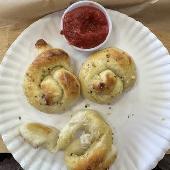 Dhillon's Pizza - Garlic bread knots with marinara sauce - Pizza Near Me - Yuba City, California Dhillon's Pizza - Garlic bread knots with marinara sauce - Pizza Near Me - Yuba City, California