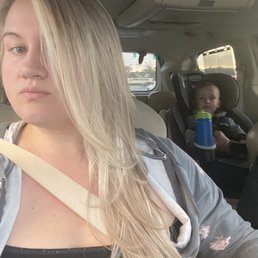 Silky baby blonde, Brazilian blow out, and layers by Cara .