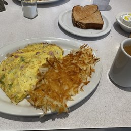 Denver omelette, with hashbrowns, coffee, and toast Denver omelette, with hashbrowns, coffee, and toast