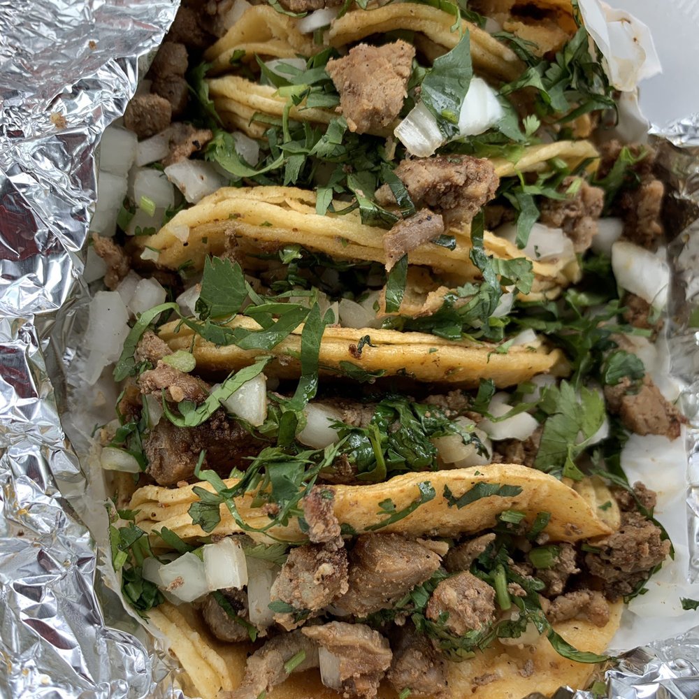 6 mini tacos & agua de limon OOF this was delicious 6 mini tacos & agua de limon OOF this was delicious
