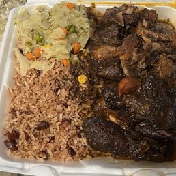 Oxtail Combo Plate with Brown Stew Chicken, Rice and Peas, and Steam Vegetables Oxtail Combo Plate with Brown Stew Chicken, Rice and Peas, and Steam Vegetables