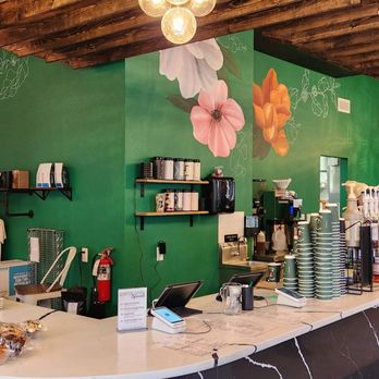 Grace Coffee - a green wall with flowers on it - Breakfast & Brunch Near Me - Milwaukee, Wisconsin Grace Coffee - a green wall with flowers on it - Breakfast & Brunch Near Me - Milwaukee, Wisconsin