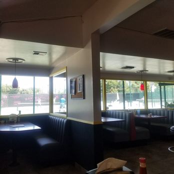 The Barnyard at Match Point Grill - View of the tennis court - American Near Me - Bakersfield, California
