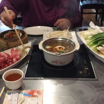 Yang's Shabu Shabu - Hot and spicy base w/ beef dinner special and added mushrooms. - Chinese Near Me - Evansville, Indiana Yang's Shabu Shabu - Hot and spicy base w/ beef dinner special and added mushrooms. - Chinese Near Me - Evansville, Indiana