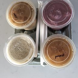 top left coldbrew with halfnhalf top right island berry smoothie bottom left chocolate milk smoothie bottom right coldbrew with almond milk