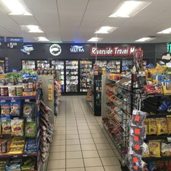 Riversidde Travel Mart - Riverside Travel Mart just completed extensive renovations for our customers. BP fuels, A&W and Godfather's Pizza are available.