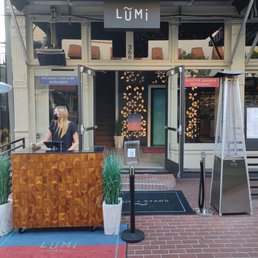 Exterior outside entrance of Lumi - Hostess stand outside the front entrance - San Diego, California Exterior outside entrance of Lumi - Hostess stand outside the front entrance - San Diego, California