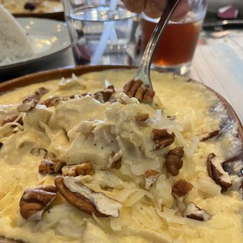 Cafe De Martin - Shredded chicken dish topped with walnuts - Peruvian Near Me - Tallahassee, Florida Cafe De Martin - Shredded chicken dish topped with walnuts - Peruvian Near Me - Tallahassee, Florida