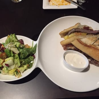 The Woods Jupiter - Ribeye On Baguette w/Woods salad - New American Near Me - Jupiter, Florida The Woods Jupiter - Ribeye On Baguette w/Woods salad - New American Near Me - Jupiter, Florida