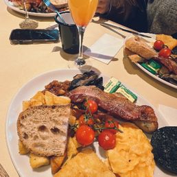 Full English breakfast and mimosa Full English breakfast and mimosa