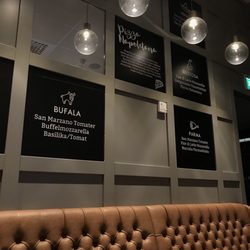 Taverna Gusto - Modern wall decor that includes some of the menu