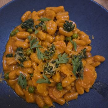 Camaraderie - Carrot cavatelli with carrot top pesto - New American Near Me - Houston, Texas