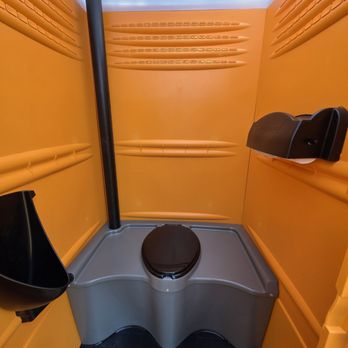 Clear Choice Site Services - Standard orange portable toilet unit with secure lock and ventilation, perfect for long-term job sites - Portable Toilet Services Near Me - Gallatin, Tennessee Clear Choice Site Services - Standard orange portable toilet unit with secure lock and ventilation, perfect for long-term job sites - Portable Toilet Services Near Me - Gallatin, Tennessee