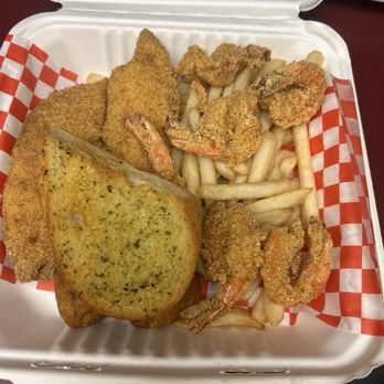 Capt. Benny's - Shrimp and fish, hush puppies french fries Yum Yum - Seafood Near Me - Houston, Texas