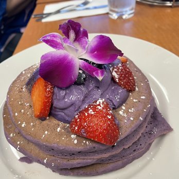 Guieb Cafe - Ube mascarpone pancakes with fresh berries Ube Mascarpone Pancakes - New American Near Me - Honolulu, Hawaii