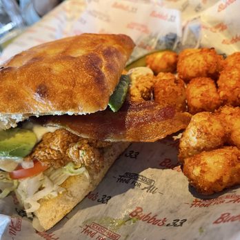 Bubba's 33 - Avocado bacon fried chicken sandwich with taters - Pizza Near Me - Parlin, New Jersey