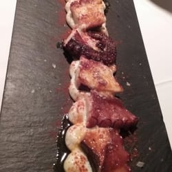 Los Raqueros - Pulpo braseado sobre espuma de patata.