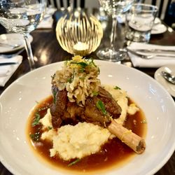100 Steps Kitchen + Raw Bar - Lamb Shank, creamy polenta, fennel, Demi glacé jus