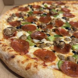 Hangout Pizza & Pub - Our Combination Pizza is a clear crowd-pleaser, standing as a consistent fan favorite among our customers.