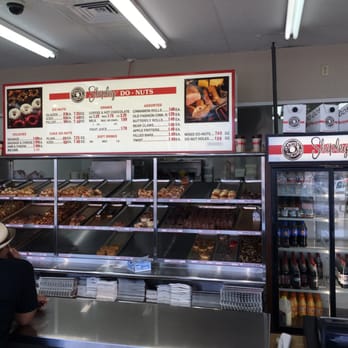 Shipley Do-Nuts - a man sitting at a counter in a donut shop - Donuts Near Me - Houston, Texas Shipley Do-Nuts - a man sitting at a counter in a donut shop - Donuts Near Me - Houston, Texas
