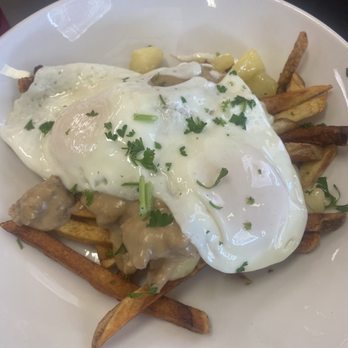 Eclectic Diner & Sweeterie - Brunch fries with sausage gravy cheese curds and over easy eggs - American Near Me - Delaware, Ohio Eclectic Diner & Sweeterie - Brunch fries with sausage gravy cheese curds and over easy eggs - American Near Me - Delaware, Ohio