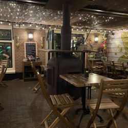 Café ONS - Wood burning stove in the patio area