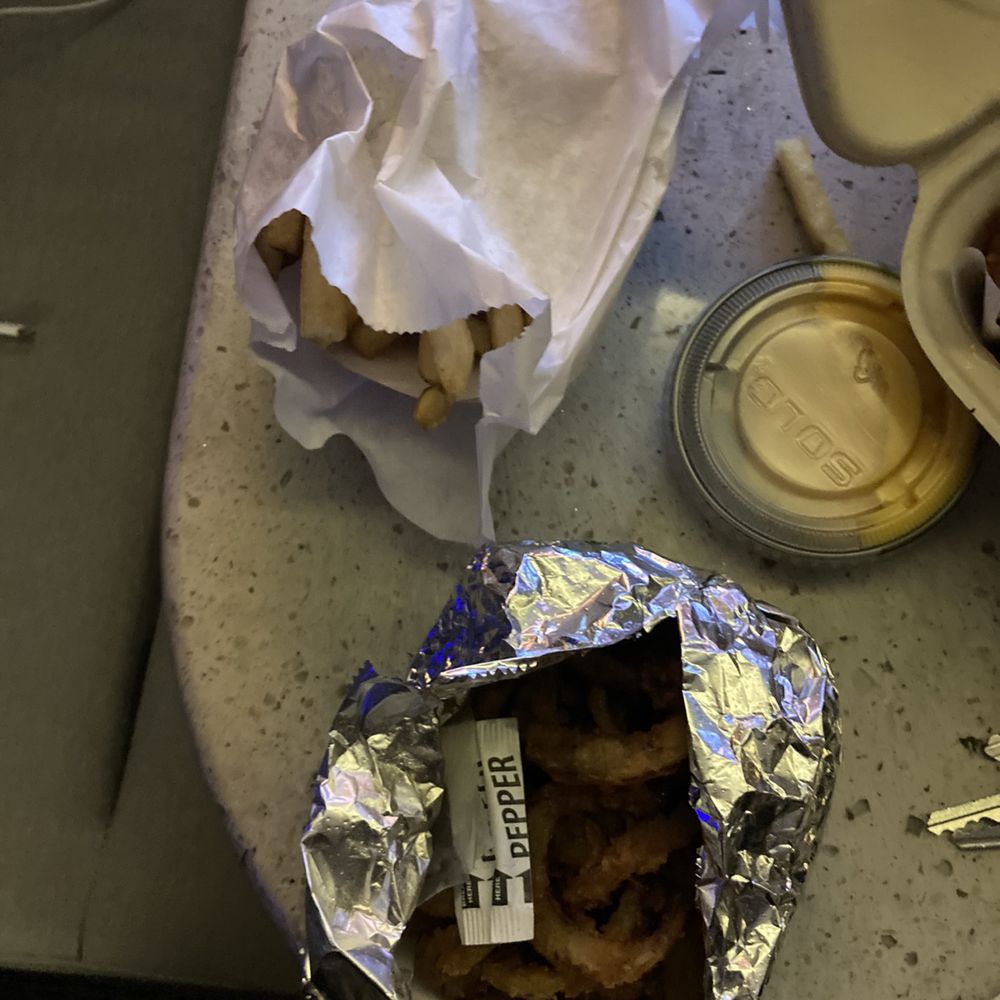 Char-Hut - a bag of fried chicken on a table - Burgers Near Me - Davie, Florida Char-Hut - a bag of fried chicken on a table - Burgers Near Me - Davie, Florida