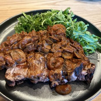 Monaco Italian Kitchen - Filet Mignon. The mushrooms are on top of the filet - Cocktail Bars Near Me - Irvine, California
