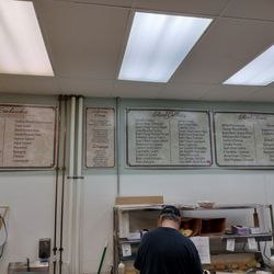 Louie's Deli & Imports - Deli meats by the pound; add-ons for subs.