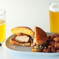 Nashville Hot Chicken Sandwich with corn relish, mayo all on a house-made Brioche bun.