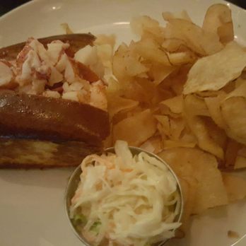 Row 34 - Seaport - Warm Buttered Lobster Roll (in half) - New American Near Me - Boston, Massachusetts Row 34 - Seaport - Warm Buttered Lobster Roll (in half) - New American Near Me - Boston, Massachusetts