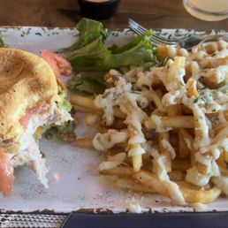 Grilled chicken sandwich with guac and truffle fries