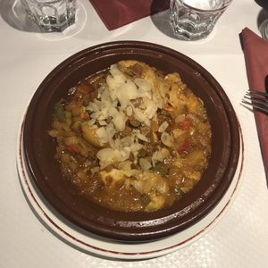Photo of Chez Hamadi - Paris, France. Chicken tajine with almonds and raisins