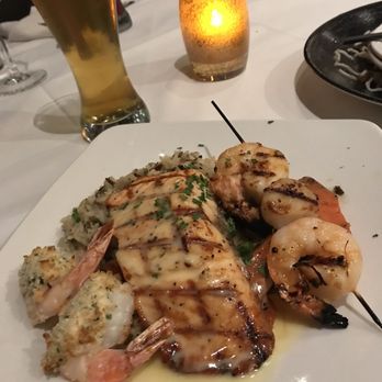 The Boathouse Restaurant - Salmon Shrimp,scallop on a bed of rice - Seafood Near Me - Port Moody, British Columbia The Boathouse Restaurant - Salmon Shrimp,scallop on a bed of rice - Seafood Near Me - Port Moody, British Columbia
