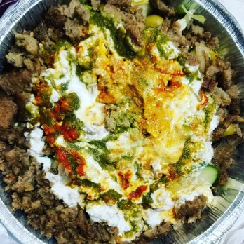 Halal Munchies - Lamb salad with cucumber salad, olives, shredded cheese, red, white and green sauces - Halal Near Me - Fresh Meadows, New York