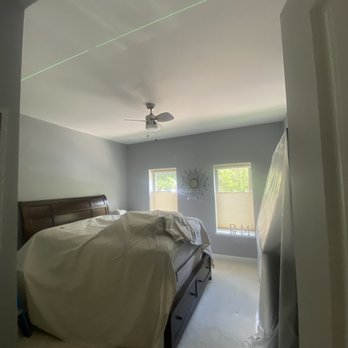 Nighthawk Electric - Using my laser to set up my can light locations. - Electricians Near Me