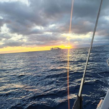 Oahu Catamarans - Sun setting - Boat Charters Near Me - Honolulu, Hawaii Oahu Catamarans - Sun setting - Boat Charters Near Me - Honolulu, Hawaii