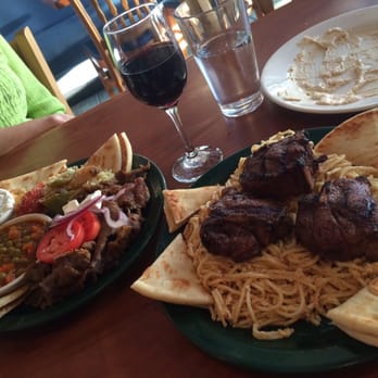 Athina Grill - You can see our devoured hummus in the background.. - Greek Near Me - Seattle, Washington