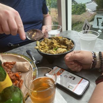 Sheger Spring Cafe - a man and a woman sharing a meal - Ethiopian Near Me - Silver Spring, Maryland