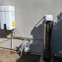 Tommy's Tankless Water Heaters & Whole House Filtration - Navien 240 A  stage whole home system