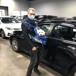 Preferred Sales and Leasing - Me (and Goose!) inside the dealership.