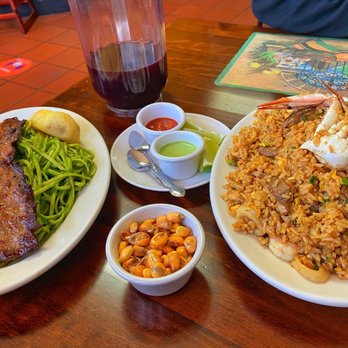 El Eslabon Restaurant - Amazing chaufa rice on the right, an okay tallarin con carne on the left. - Peruvian Near Me - West New York, New Jersey