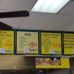 First time here, waiting for my tacos! Here's a better view at the menu, since the other one is at an angle. SWEETEST LADIES!