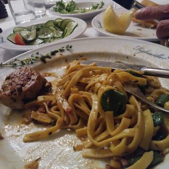 Figlmüller - pork medallions with green beans, bacon sauce and homemade noodles; cucumber salad, frisee salad and weiner schnitzel - Austrian Near Me - Vienna, 9 Figlmüller - pork medallions with green beans, bacon sauce and homemade noodles; cucumber salad, frisee salad and weiner schnitzel - Austrian Near Me - Vienna, 9
