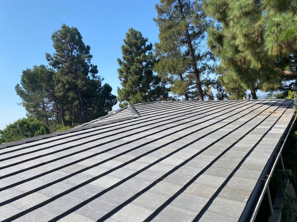 Slide of United Frontier Roofing